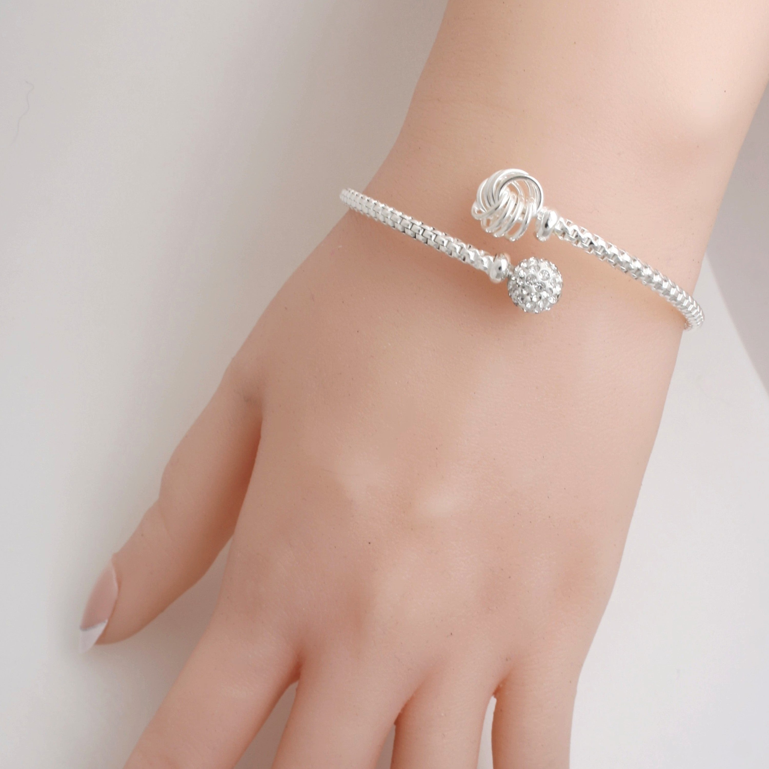 Sterling Silver Love Knot Torque Bangle